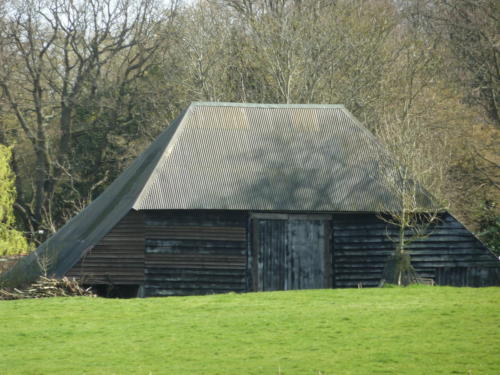 A traditional wooden barn in Sandhurst